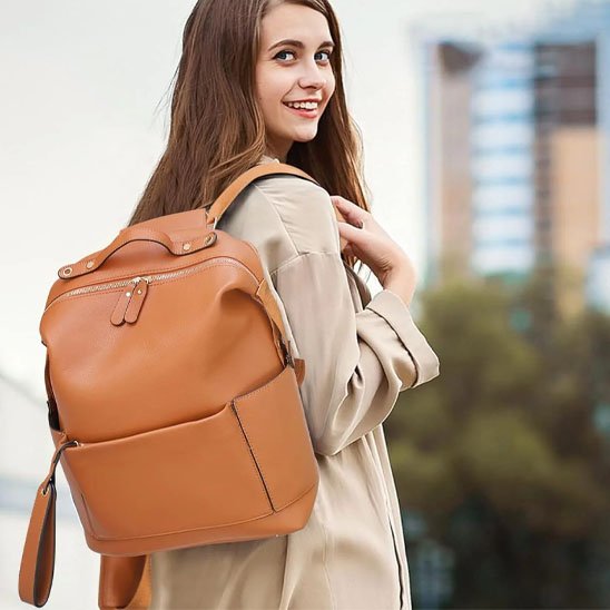 Sac à langer sac à dos cognac pour bébé en similicuir, sac maternité tendance grande capacité.