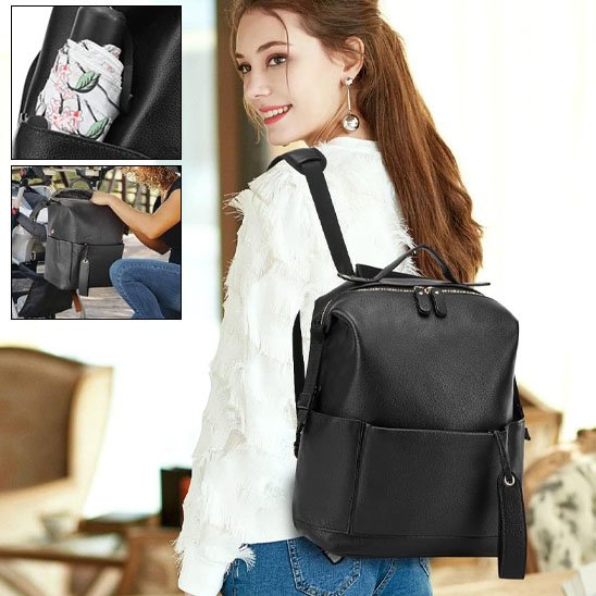 Sac à langer sac à dos noir pour bébé avec bretelles rembourrées et attaches poussette.