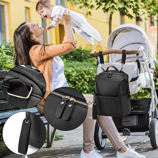 Sac à langer noir pour bébé avec accessoires, sac à dos maternité avec compartiments isothermes.